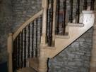 kited wooden staircase metal balustrade