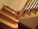 kited wooden staircase metal balustrade