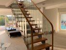 Steel staircase with timber treads and glass balustrades